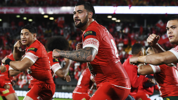 NRL stars Jason Taumalolo and Andrew Fifita in action for Tonga.
