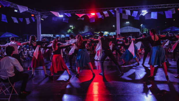 The festive and vibrant atmosphere of the Paniyiri Greek Festival in Brisbane, which is Australia’s longest-running Greek festival.