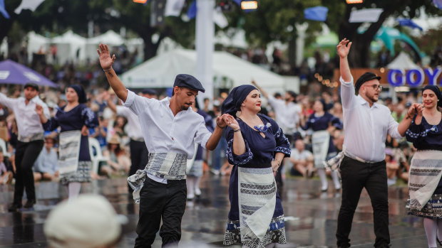 The festive and vibrant atmosphere of the Paniyiri Greek Festival in Brisbane.