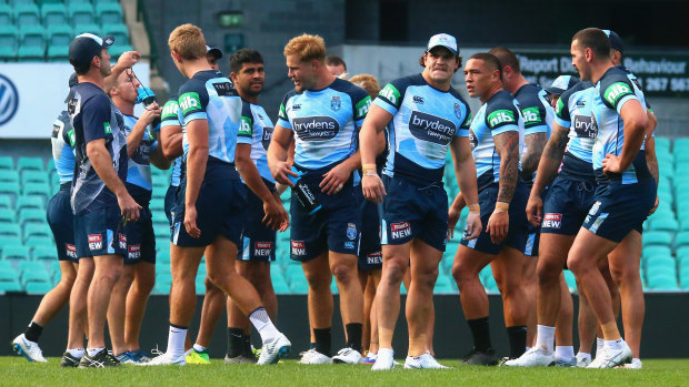 The NSW Blues take a break during a team training session at the Sydney Cricket Ground.