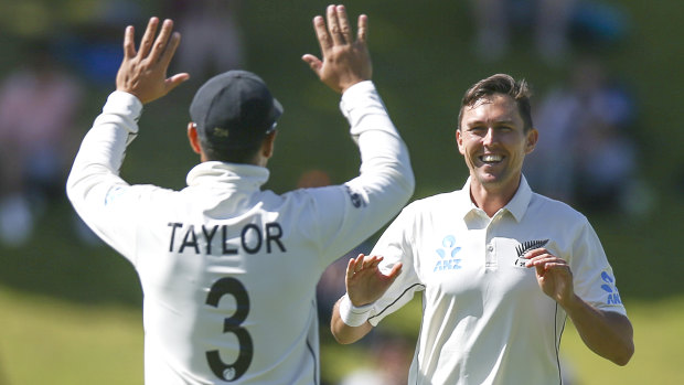 Trent Boult of New Zealand celebrates after taking the wicket of Ajinkya Rahane.