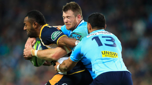 Head of steam: Jed Holloway and Curtis Rona try to drag down Tevita Kuridrani.