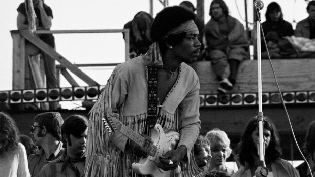 Jimi Hendrix during his legendary two-hour performance at the close of the Woodstock  festival.