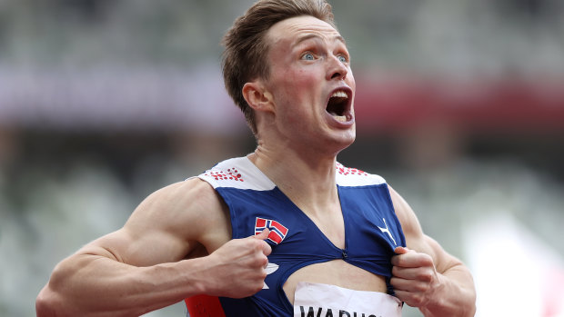 Norway’s Karsten Warholm reacts after beating his own world record mark.