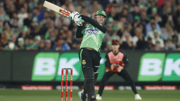 Tom Rogers of the Stars hits the final ball to win their match against the Renegades.