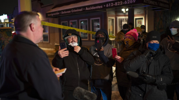Minneapolis Police spokesman John Elder briefed community members.