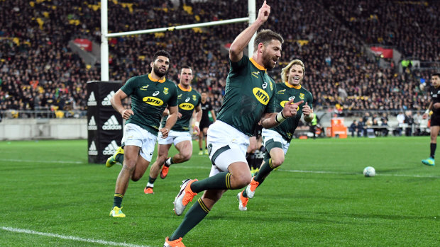 Rarity: South Africa's Willie le Roux celebrates during their upset victory in New Zealand.