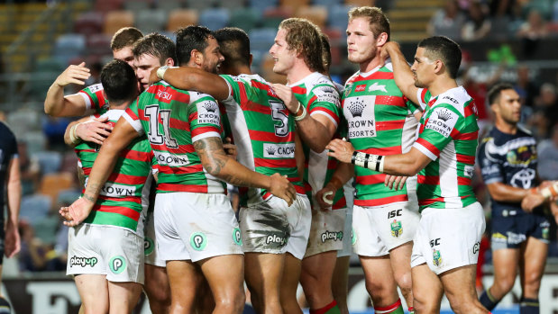 Last-gasp: South Sydney celebrate after snatching victory over the Cowboys with the last kick of the game.