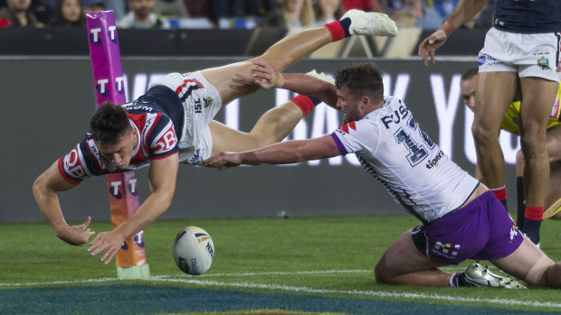 Star performer: Joseph Manu crosses out wide in the 2018 grand final.