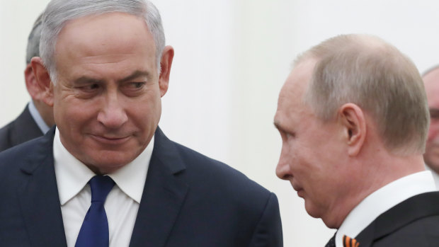 Israeli Prime Minister Benjamin Netanyahu, left,  meets Russian President Vladimir Putin in Moscow on Wednesday.