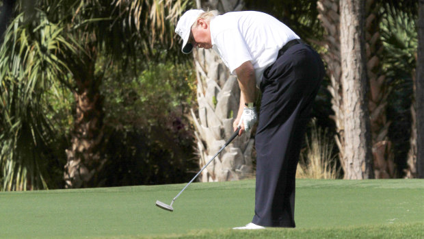 Trump was golfing near Mar-a-Lago when the Chinese woman was arrested.