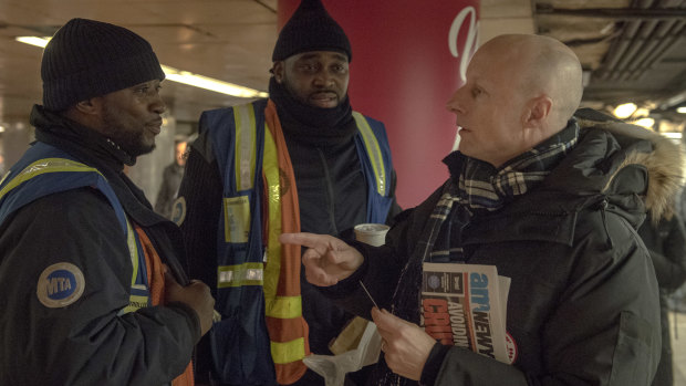 Andy Byford chats with subway workers on his first day as president of New York City Transit.