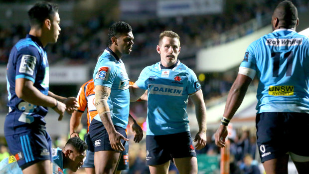 Passion: The Waratahs' battle against the Blues drew a healthy crowd to Brookvale Oval.