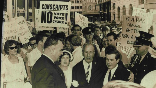 Wayne Haylen outside court with his father, former Labor MP Leslie Haylen, on April 7, 1966. Wayne was charged after burning his conscription notice for the Vietnam War.