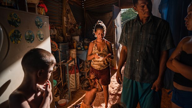 Yolman Lares at home with his family in Guaca, Venezuela.