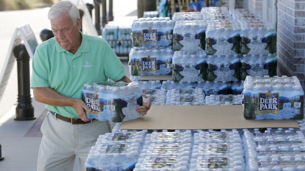 Larry Pierson purchases bottled water in Isle of Palms, South Carolina, in preparation for hurricane Florence.