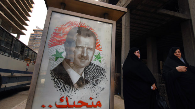 A poster of President Bashar Assad in Damascus, Syria
