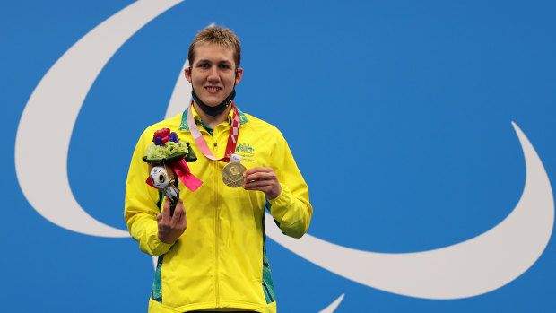 Will Martin on the podium with his  gold medal after the S9 400m freestyle final. 
