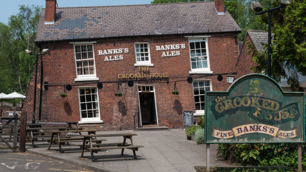 Developers ordered to rebuild ‘Britain’s wonkiest pub’ brick by brick