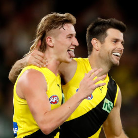 Hugo Ralphsmith celebrates a goal with Trent Cotchin.