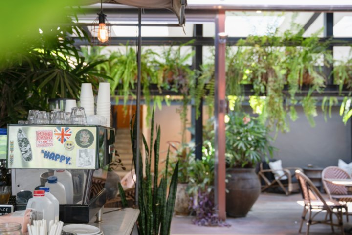 The complex includes a central atrium and a licensed cafe.