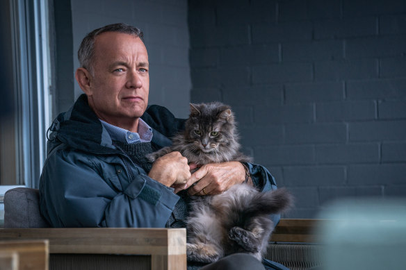 Tom Hanks, aka the novelist Tom Hanks, with his feline friend in A Man Named Otto.