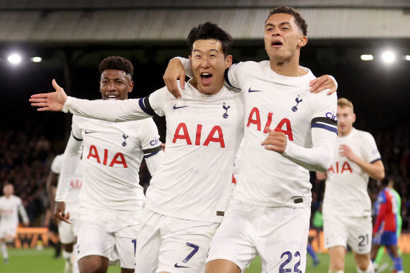 Son Heung-Min and Tottenham teammates celebrate a goal.