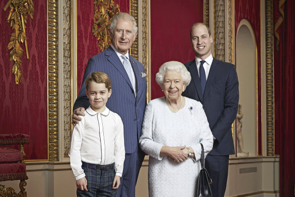 Queen Elizabeth, Prince Charles, Prince William and Prince George pose for a photo to mark the start of the new decade.