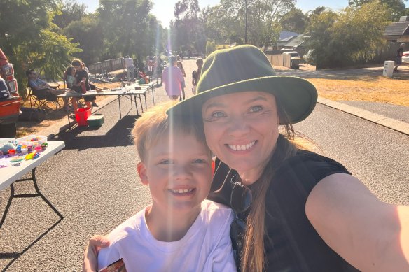 Valuing Children Initiative development executive Sarah Quinton with her son Jarvis at a street party in Eden Hill. 