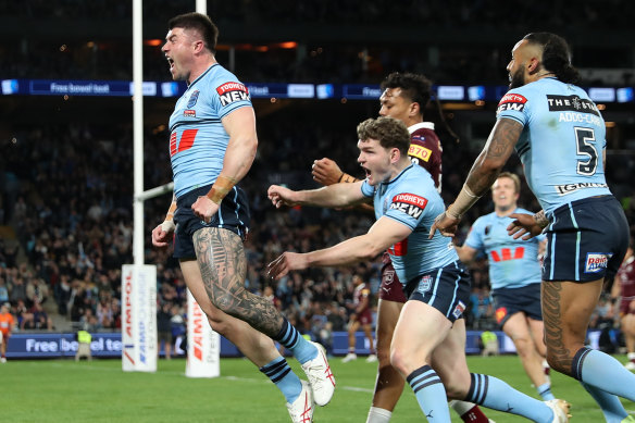 Happy days: Bradman Best celebrates one of two tries during his Origin debut.