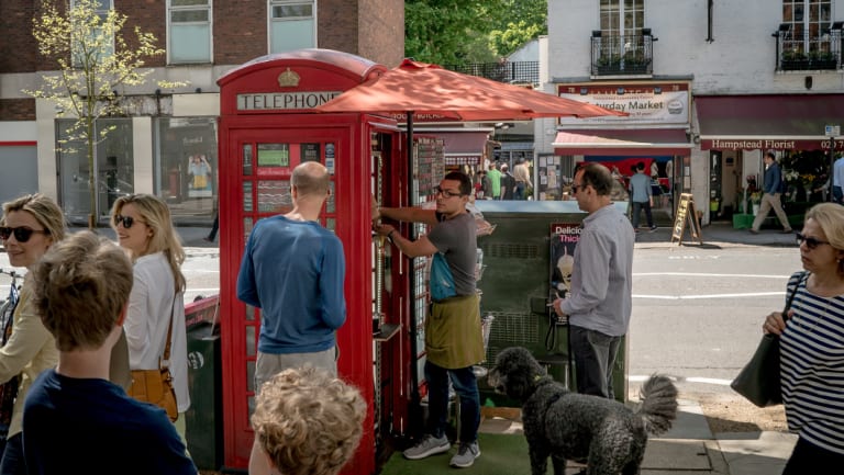 A new generation of phone boxes is replacing the iconic red ones, which have been either removed or, in this case, repurposed.