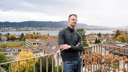 Philip Skiba on the terrace of his rental home in Zollikon, Switzerland, with a view of Lake Zurich.