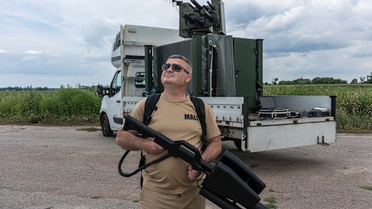 Yurii Momot, a founder of Piranha-Tech, with an anti-drone gun that can jam the communications signals used to control small commercial drones, in Kyiv, Ukraine.
