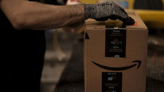 Warehouse workers get a pay bump as Amazon struggles to find enough staff to handle the pandemic-fuelled boom in orders.
