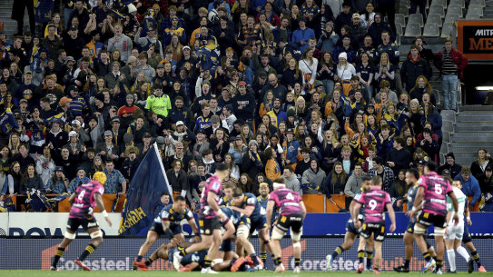 Fans packed out the match between the Highlanders and Chiefs in Dunedin on Saturday.