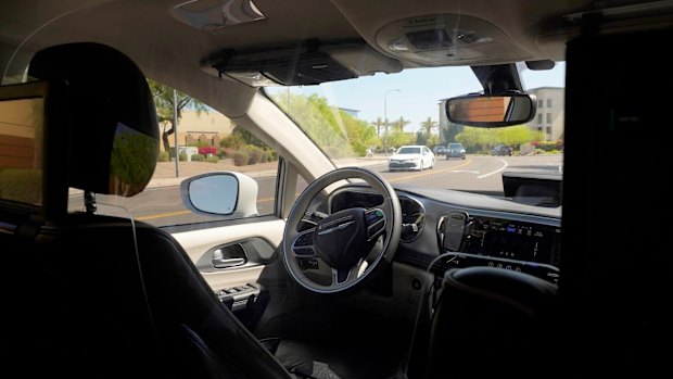 The empty driver’s seat on board a driverless vehicle.