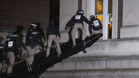New York police enter an upper floor of Hamilton Hall at Columbia University to arrest protesters.