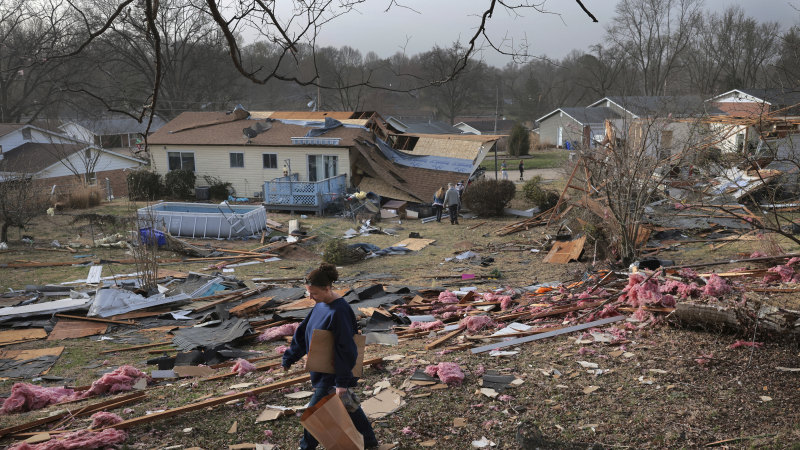 ‘The floor was upside-down’: At least 32 dead as monster storm rips through US