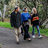 Chris Chesterfield, Nichola Lefroy and Charley Woolmore walking along the Yarra River main trail in Abbotsford.