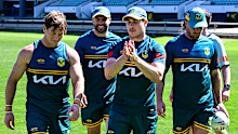 Mitchell Moses and his Kangaroos teammates.