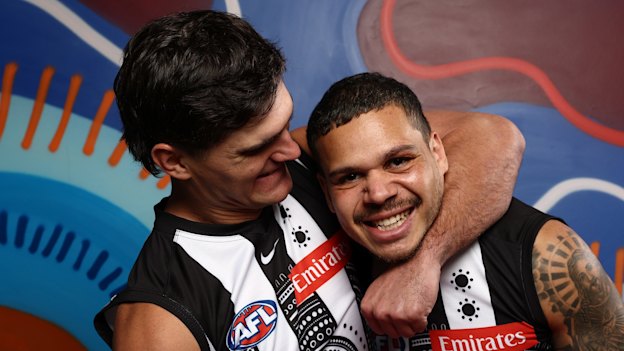 Teammates Lachie Schultz and Bobby Hill muck around at the launch of the AFL’s Sir Doug Nicholls round.