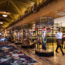 Parlour at QT Sydney has kept the original glass vitrines of Gowings department store and continues to  house fashion.