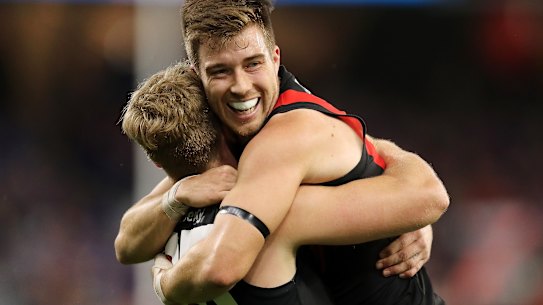 Jake Stringer and Zach Merrett celebrate a goal against the Eagles.