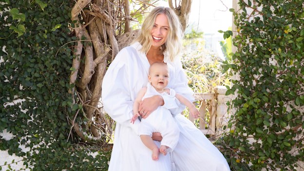 Sylvia wears Valentino dress, Fendi shoes. Oscar wears Numero 74 romper suit from Kido.