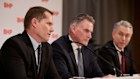BHP’s new chief executive Brandon Craig, chairman Ross McEwan and departing chief executive Mike Henry announcing the transition to new leadership on Wednesday.