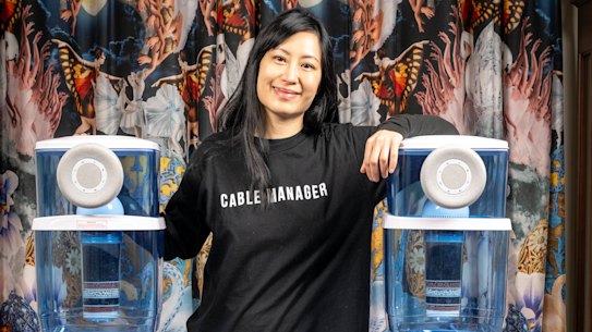 Monica Lim with her talking water coolers.