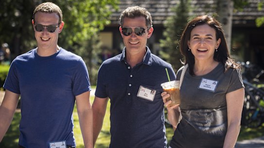 Sheryl Sandberg with Mark Zuckerberg and then-Facebook executive Dan Rose in 2018.  