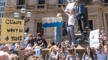 School children striking from school and protesting in the streets of Melbourne for the Government to take action on Climate Change.