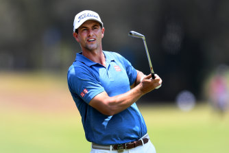 Adam Scott follows his shot on day three of the Australian PGA Championship at  Royal Pines Resort on Saturday.