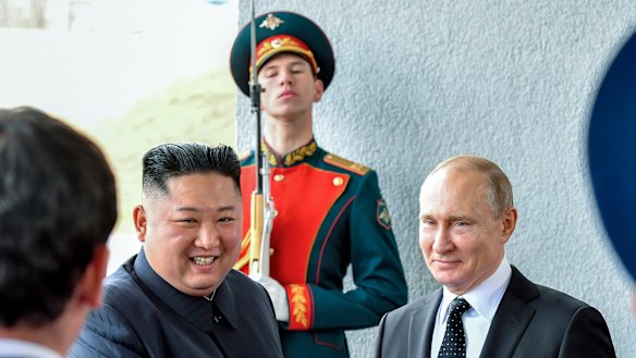 Russian President Vladimir Putin, right, and North Korean leader Kim Jong-un meet for the first time.